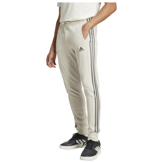 Adidas Ανδρικό παντελόνι φόρμας Essentials French Terry Tapered Cuff 3-Stripes Joggers